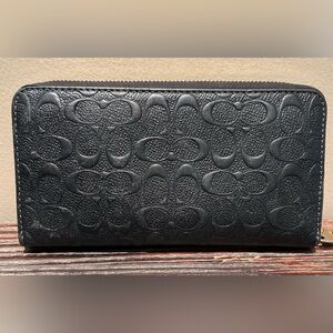 Coach black leather embossed wallet